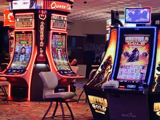 Row of slot machines on a casino floor